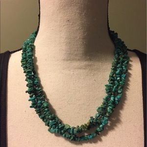 Genuine turquoise and silver three strand necklace